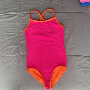 Primary reversible swimsuit. Size 8/9 pink and orange